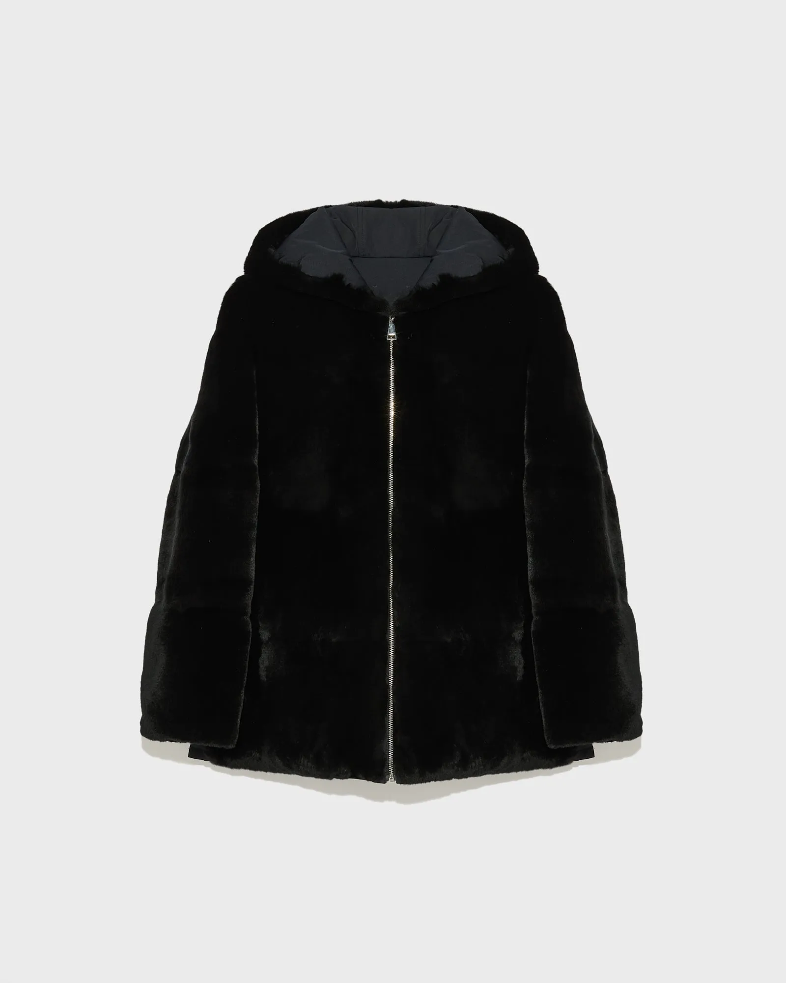 Reversible hooded parka in rabbit rex fur and technical fabric